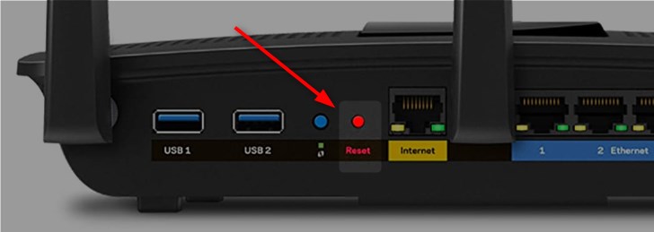 Factory reset button on Linksys router