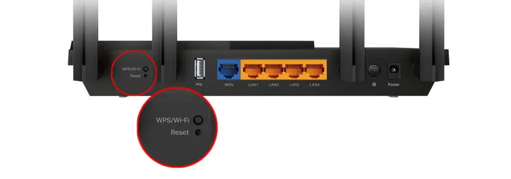 Reset button at the back of the router